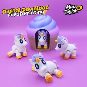 May include: A digital download for 3D printing featuring a cupcake-shaped house with a purple top and a white base, housing a unicorn figurine. Three additional white unicorn figurines with purple manes and yellow hooves are also present.