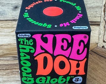 Nuevo en caja - Pelota antiestrés Schylling NeeDoh Groovy Glob - Naranja