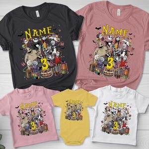 Pode incluir: Uma cole&ccedil;&atilde;o de camisetas e um body com um design gr&aacute;fico colorido com personagens, o n&uacute;mero 3 e a palavra "Name" em amarelo. As camisetas s&atilde;o em v&aacute;rias cores, incluindo preto, rosa e branco.