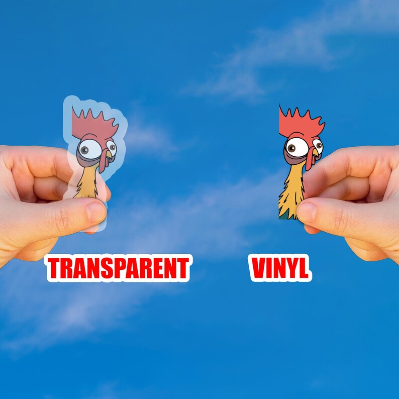 May include: Two stickers of a cartoon rooster are held up against a blue sky. One is transparent, and the other is vinyl. The transparent sticker has the word "TRANSPARENT" in a red box. The vinyl sticker has the word "VINYL" in a red box.