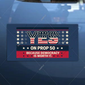 May include: Rectangular sticker with a distressed design. The word "YES" is in large letters, with the stars and stripes pattern. Below, it reads "ON PROP 50 BECAUSE DEMOCRACY IS WORTH IT." The background is navy blue.