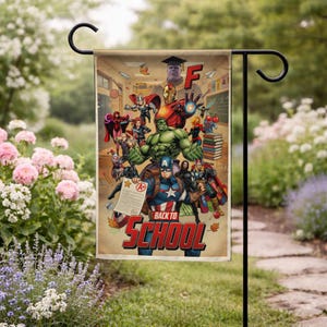 May include: A garden flag featuring a collage of Marvel superheroes with the text "Back to School". The flag includes Captain America, Hulk, Iron Man, and other characters in a classroom setting. The flag is displayed on a black metal stand.