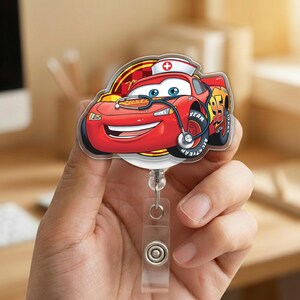 May include: A red Lightning McQueen badge reel with a nurse's hat and stethoscope design. The badge reel features a clear plastic clip and a retractable cord. The number 95 is visible on the side of the car.