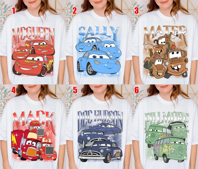 May include: White t-shirts featuring various Cars movie characters. Designs include Lightning McQueen, Sally, Mater, Mack, Doc Hudson, and Fillmore. Each design has a vintage, distressed look, with character names prominently displayed.