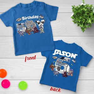 May include: Blue short-sleeved t-shirt with a Star Wars theme. The front features the word "Birthday" and "BOY" with character graphics. The back of the shirt has the name "JASON" and the number "6".