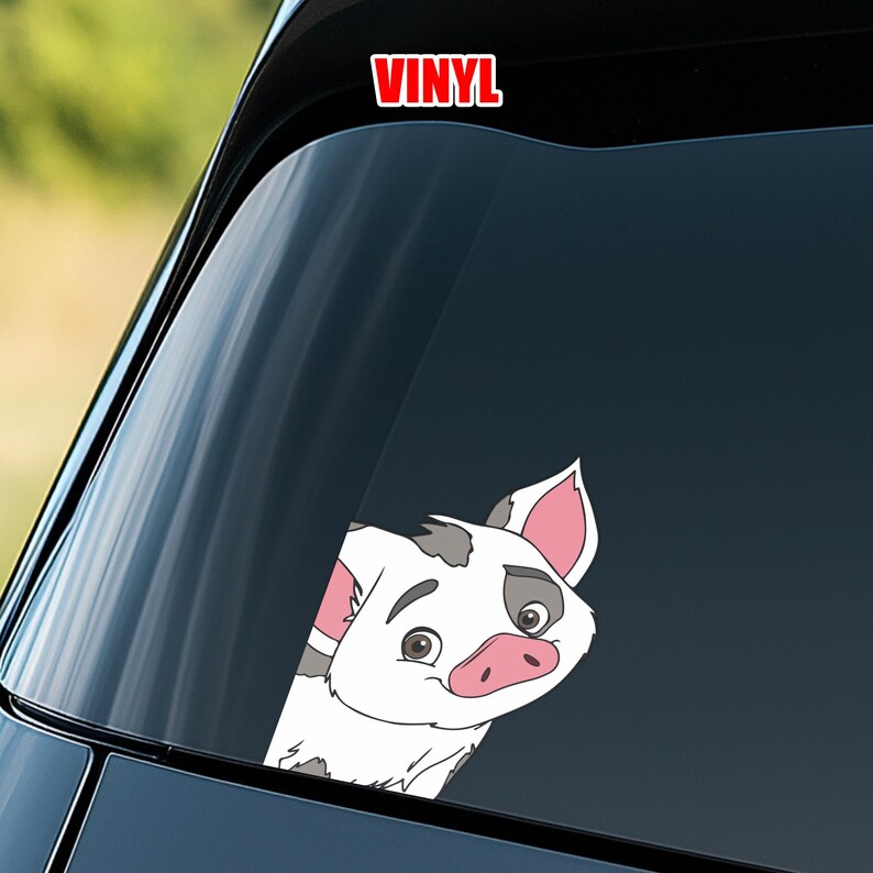 May include: A white vinyl decal featuring a cartoon pig with a pink snout and ears, and gray spots. The decal is applied to a car window. The word "VINYL" is printed in red at the top.