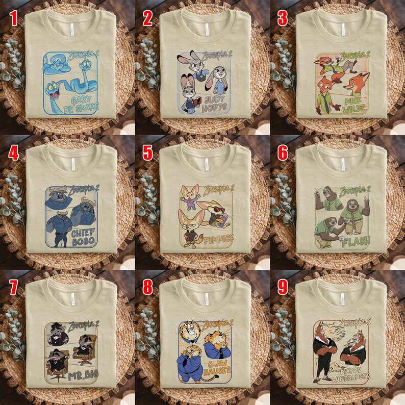 May include: Nine beige t-shirts with different Zootopia 2 character designs. Each shirt features a unique graphic, including characters like Gary, Judy Hopps, Nick Wilde, Chief Bogo, Finnick, Flash, Mr. Big, Clawhauser, and Yax.