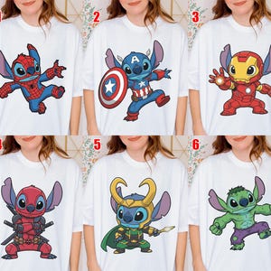 May include: White t-shirts featuring cartoon character Stitch in various superhero costumes. Designs include Spider-Man, Captain America, Iron Man, Deadpool, Loki, and the Hulk. Each shirt has a unique, colorful graphic.