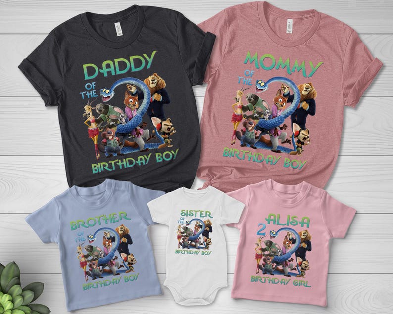 May include: A collection of matching family birthday shirts in various colors. The shirts feature a cartoon graphic with the text "Daddy of the Birthday Boy", "Mommy of the Birthday Boy", "Brother of the Birthday Boy", "Sister of the Birthday Boy", and "Alisa 2 Birthday Girl".