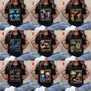 May include: Black t-shirts featuring characters from Zootopia 2. Each shirt displays a different character, including Gary De Snake, Judy Hopps, Nick Wilde, Chief Bogo, Finnick, Flash, Mr. Big, Claw Hauser, and Mayor Winddancer. The shirts have a rectangular design with the movie title.