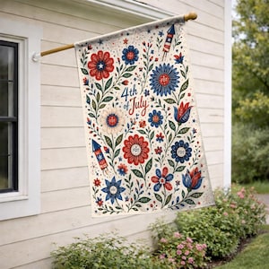 May include: A decorative outdoor flag featuring a floral design in red, white, and blue, with the text "4th of July." The flag includes stylized flowers, fireworks, and stars, perfect for celebrating Independence Day.