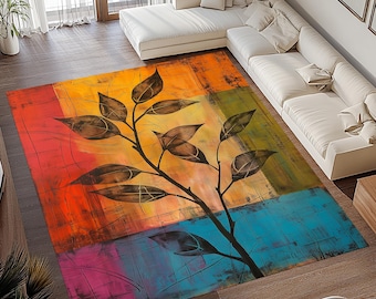 May include: A rectangular area rug with an abstract design. The rug features a colorful background with blocks of red, orange, yellow, green, blue, and purple. A black branch with brown leaves is painted across the rug.