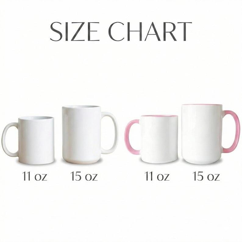 May include: A size chart displaying four white ceramic mugs. Two plain white mugs are labeled 11 oz and 15 oz. Two mugs with pink handles and interiors are also labeled 11 oz and 15 oz. The text SIZE CHART is centered at the top of the image.