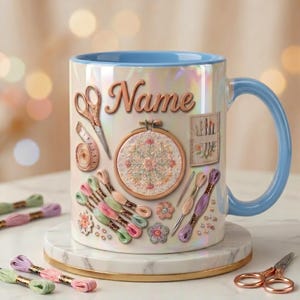 May include: A ceramic mug with a light blue interior and handle, featuring an iridescent finish. The exterior displays embroidery-themed graphics including scissors, a measuring tape, a hoop, needles, and colorful thread skeins with the word Name.