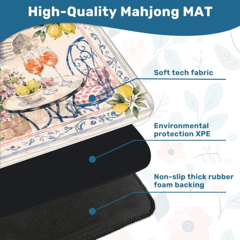 May include: A rectangular mahjong mat featuring a watercolor illustration of a table with two glasses of orange liquid and a bowl of lemons. The mat is composed of three layers: a soft tech fabric top, an environmental protection XPE core, and a non-slip thick rubber foam backing.