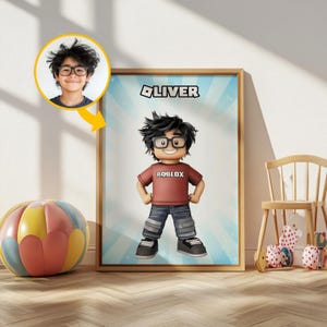 May include: A framed print with the name "OLIVER" at the top. The image shows a cartoon character wearing glasses, a red "ROBLOX" t-shirt, and jeans. A smaller photo of a boy with glasses is in the upper left corner.