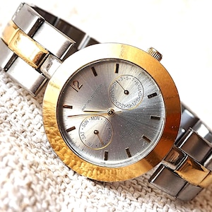 Ashley Brooke Vintage-klocka: Quartz-armbandsur i rostfritt stål