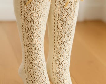 Lace knit knee high socks pattern vintage inspired feminine long socks with bow charted instructions downloadable PDF tutorial