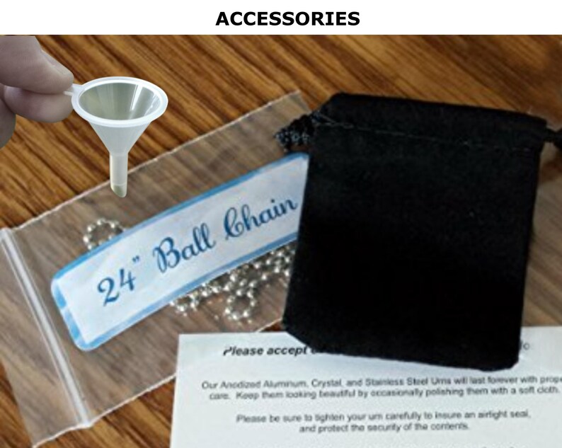 May include: A white plastic funnel, a black velvet pouch, and a clear plastic bag with a silver ball chain and a label that reads "24" Ball Chain".