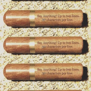 May include: Five cylindrical wooden items arranged in a vertical row. Each item features a metallic band and the printed text: Say Anything! Up to two lines, 30 characters per line. The objects have a smooth, light brown finish.