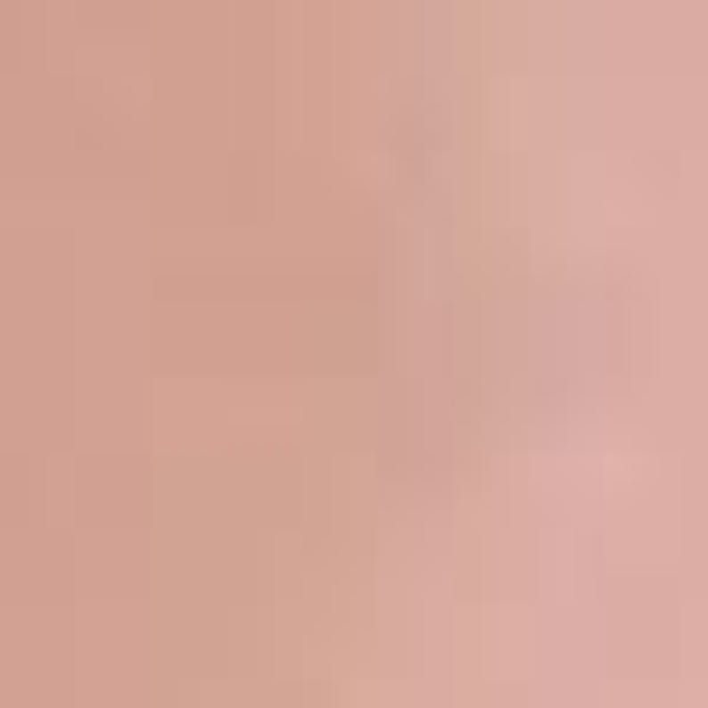 Pu&ograve; includere: Un muro rettangolare di colore rosa chiaro con una texture.