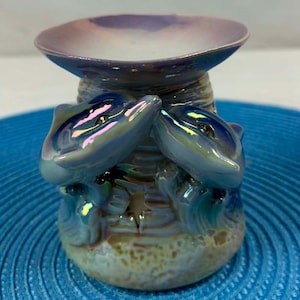 Vintage iridescent ceramic essential oil diffuser with dolphins, retro decorative burner with marine motif