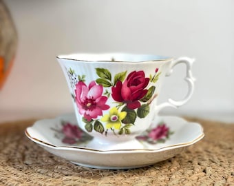 Royal Albert cup and saucer with red roses and pink flowers in English bone china