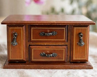 Vintage wooden jewelry box with drawers and compartments, elegant storage, classic decorative style