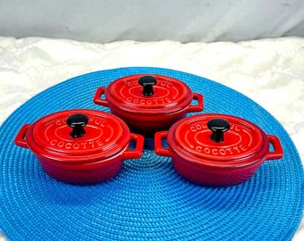 Set of three mini red ceramic casseroles, colorful vintage decorative tableware for individual servings