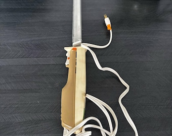 Cuchillo eléctrico GE EK9HH vintage con hoja – Probado y funcionando. Herramienta de cocina retro de los años 70. Fabricado en Canadá y EE. UU. por General Electric.