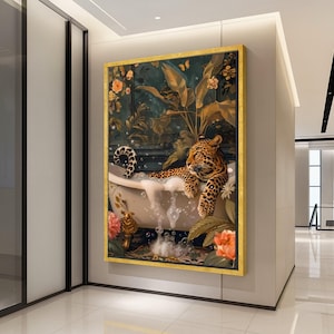 May include: A framed artwork depicts a leopard relaxing in a bathtub filled with bubbles. The artwork features a gold frame, floral and botanical elements, and a detailed illustration of the leopard with its distinctive spots. The color palette includes greens, golds, and oranges.