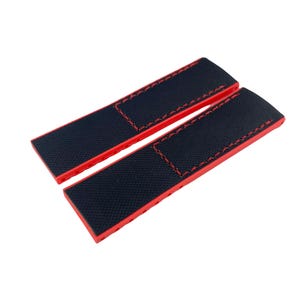 May include: Two red watch straps with black fabric inserts and red stitching.