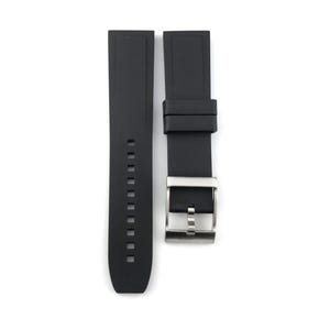 May include: Black rubber watch strap with a silver buckle.