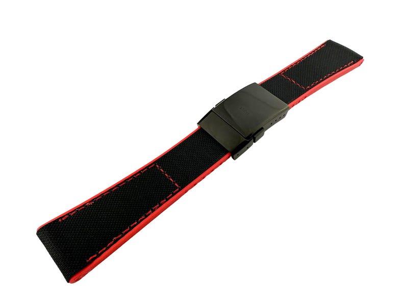 May include: A black watch strap with red stitching and a black buckle.