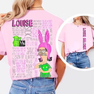 May include: A light pink t-shirt featuring a large graphic on the back with the text Louise, Sick, and various phrases alongside a cartoon character with pink bunny ears and a green shirt. A smaller circular inset shows the front of the shirt with Louise Belcher text.