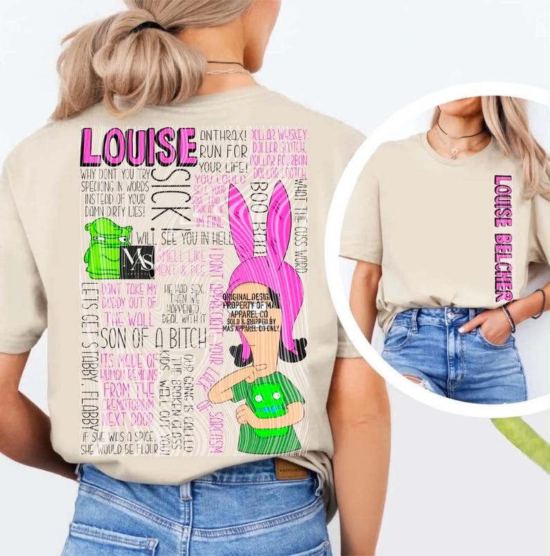 May include: A beige t-shirt featuring a large graphic on the back with a pink-eared character, a green creature, and various lines of text including "LOUISE" and "SICK". The front of the shirt displays the text "LOUISE BELCHER" vertically in pink.