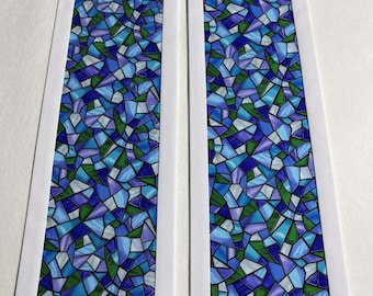 May include: Two fabric panels with a stained glass design. The pattern features irregular shapes in shades of blue, green, and purple, bordered by white fabric. The design resembles a mosaic or a stained glass window.