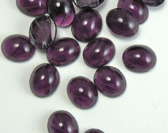Cabochon ovali in ematite vintage da 14x10 mm in vetro, parti superiori arrotondate, retro piatto, finitura a specchio con macchie, quantità 2 - Italia
