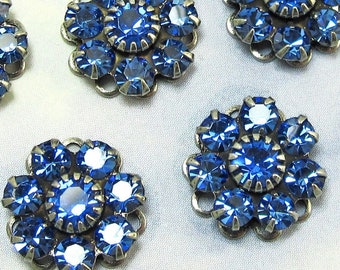 Crystal rhinestone flower 12 mm Sapphire Blue Swarovski in antique silver setting