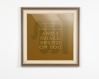 May include: A framed print with a gold background and white text. The text reads "The Prophet (PBUH) said: Allah says: Spend on charity (in the) path of Allah." and "And I shall spend on you."