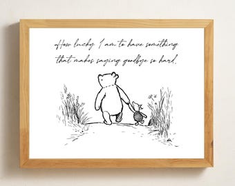 May include: A framed print featuring a black and white illustration of a bear and a pig walking together. The quote "How lucky I am to have something that makes saying goodbye so hard" is written above the characters.