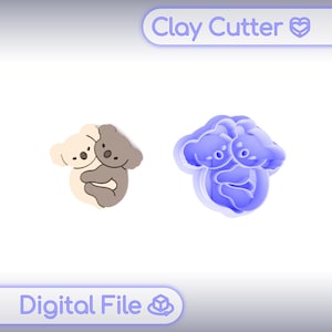 May include: A clay cutter and a finished product in the shape of two hugging koalas. The cutter is blue, and the finished product is beige and brown. The words "Clay Cutter" and "Digital File" are in the image.