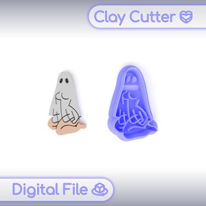 May include: A light gray ghost-shaped clay cutter and a blue ghost-shaped clay cutter. The ghost has two black eyes and is sitting with its hands folded. The text "Clay Cutter" and "Digital File" are in the image.
