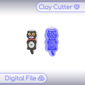 May include: A black cat-shaped clay cutter and a blue clay cutter mould. The cat design includes a clock face on its belly and a red bow tie. The text "Clay Cutter" and "Digital File" are visible.