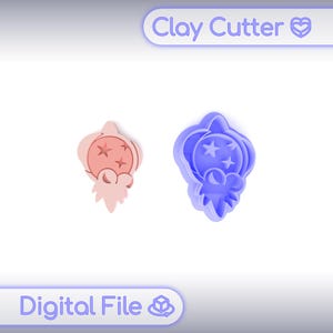 May include: Two clay cutters in the shape of a celestial body with star accents. One is light pink, the other is blue. The text "Clay Cutter" and "Digital File" are displayed in the image.