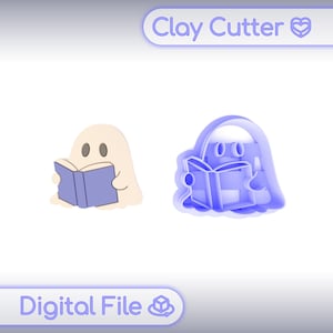 May include: A light beige ghost character reading a purple book alongside a matching purple 3D-printed clay cutter. The image includes the text Clay Cutter and Digital File with icons. The ghost has two dark oval eyes and holds the open book.