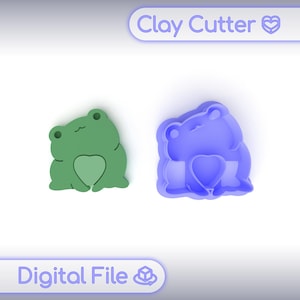 May include: Two frog-shaped clay cutters, one green and one purple, each with a heart design. The image includes the text "Clay Cutter" and "Digital File".
