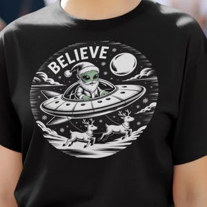 Alien Believer Graphic Tee, Unisex UFO T-Shirt, UFO Shirt, Alien Santa Shirt, Christmas Shirt, Christmas Tee, Santa Shirt, Holiday Shirt