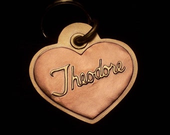 Heart-shaped copper and brass pet tag