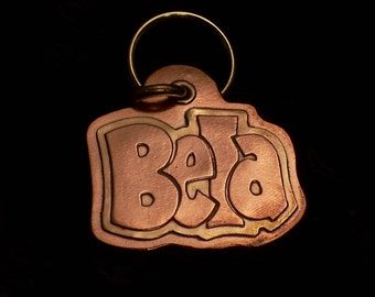 Handmade copper and brass pet tag